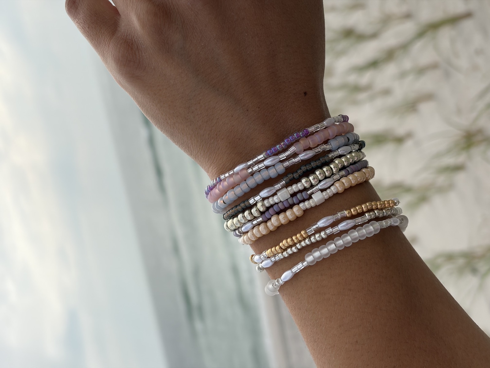 Beach wrist stack of handmade stretch bracelets