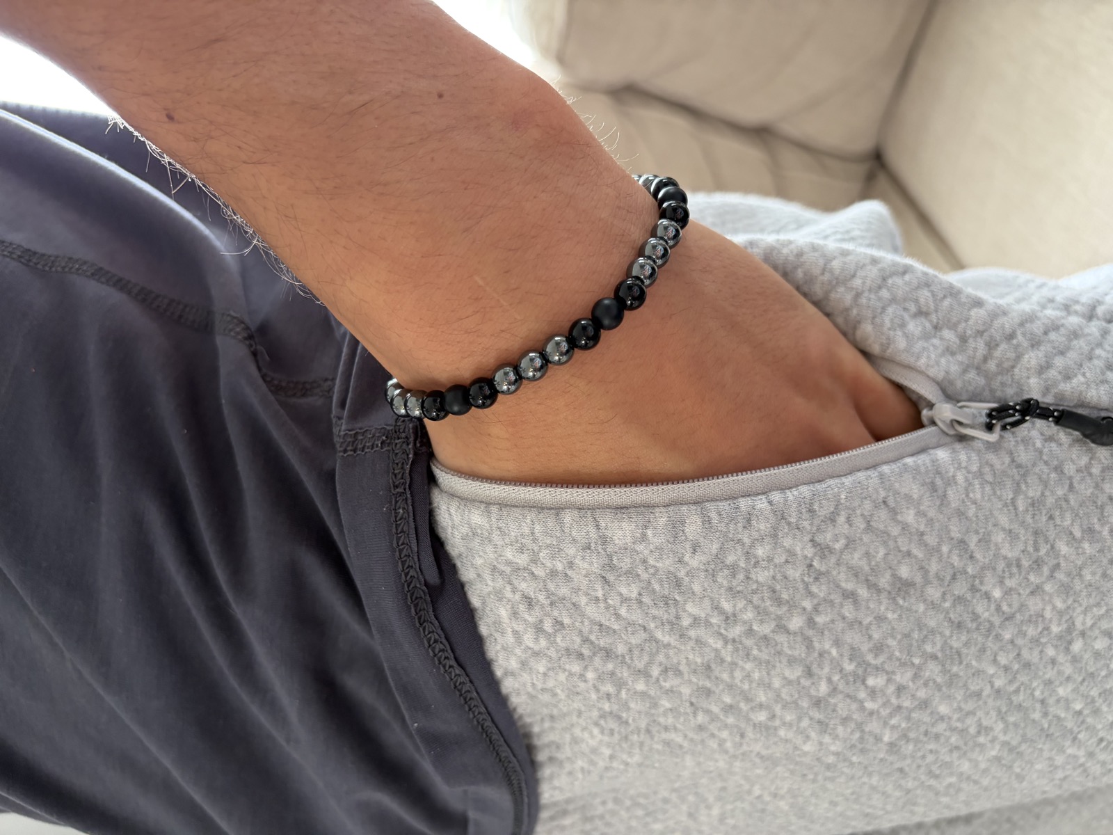 Men's onyx bracelet on a wrist