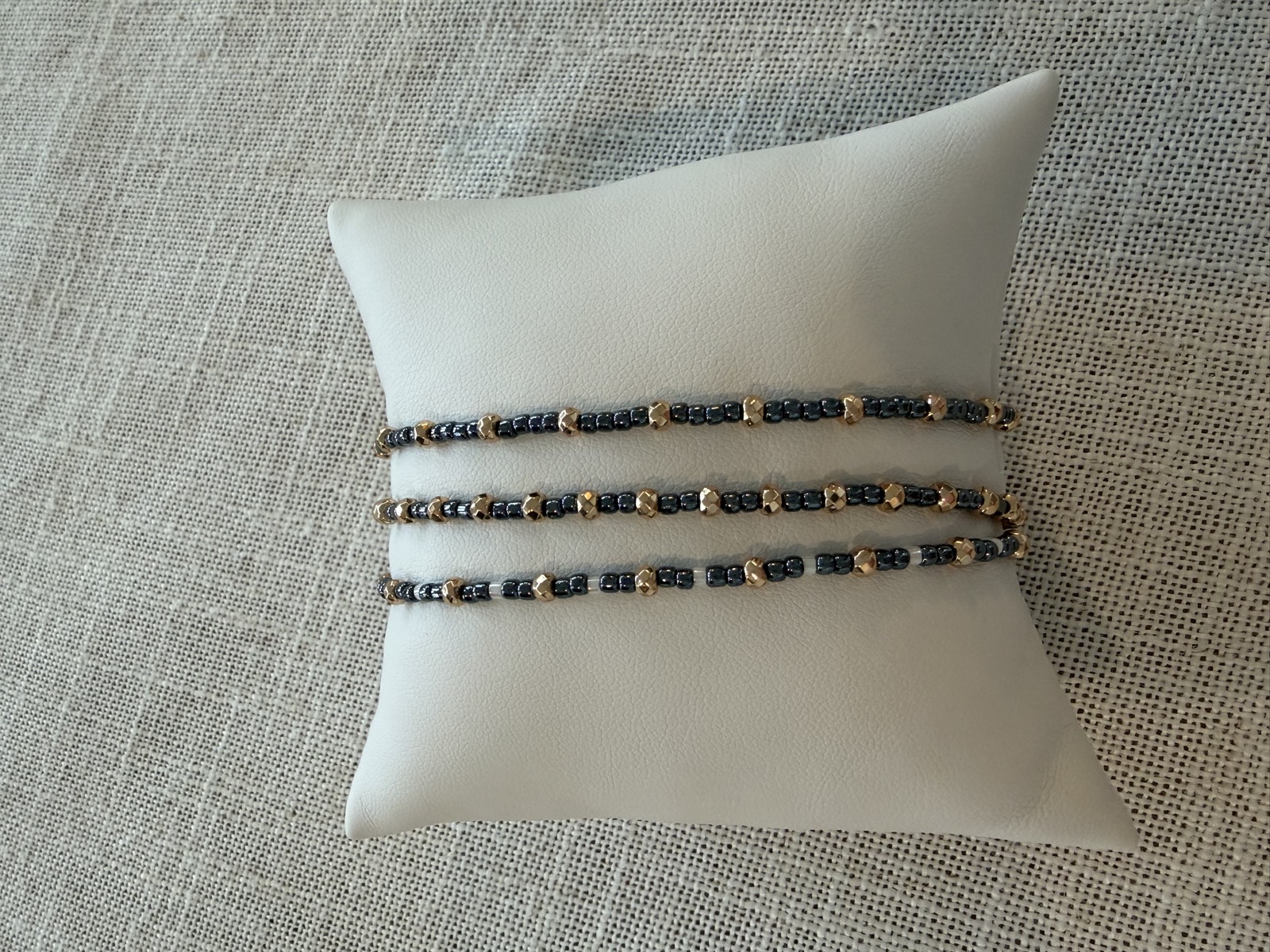 Trio of women's hematite bracelets